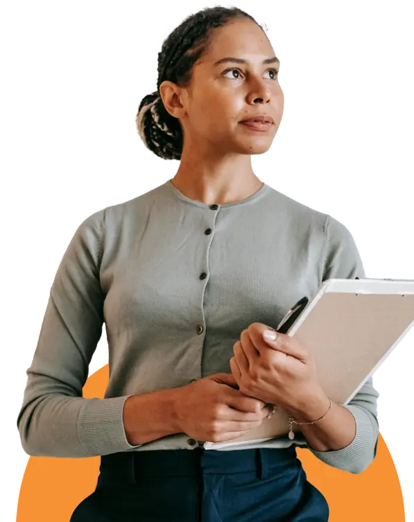 A woman holding a tablet, looking off to the side thoughtfully.