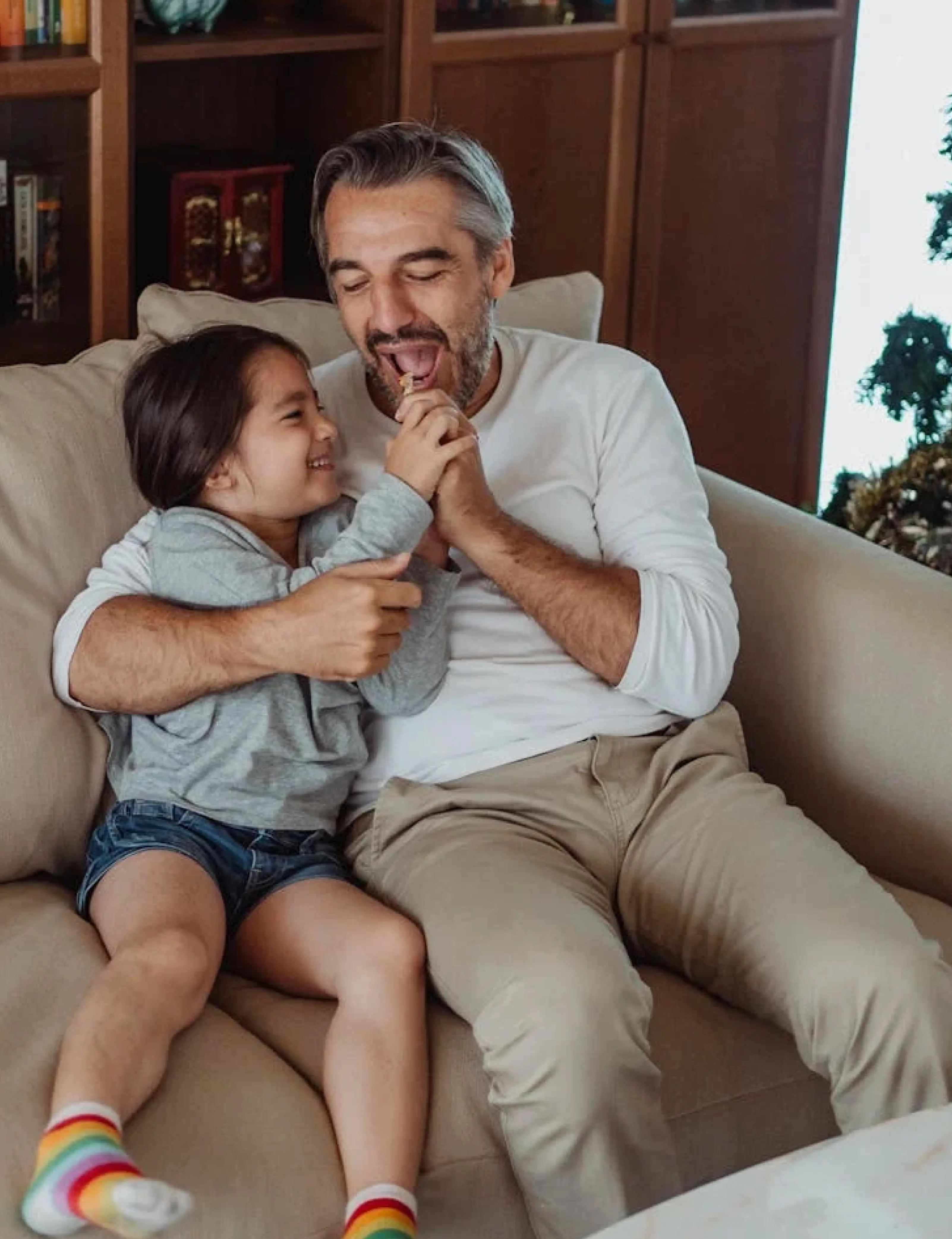 Father having fun with daughter