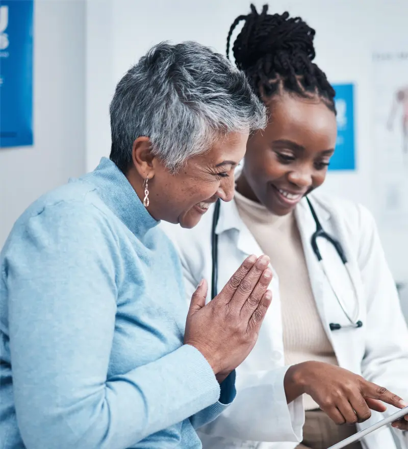 Happy woman with doctor