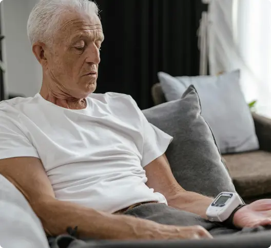 A old man checking her bleed preser