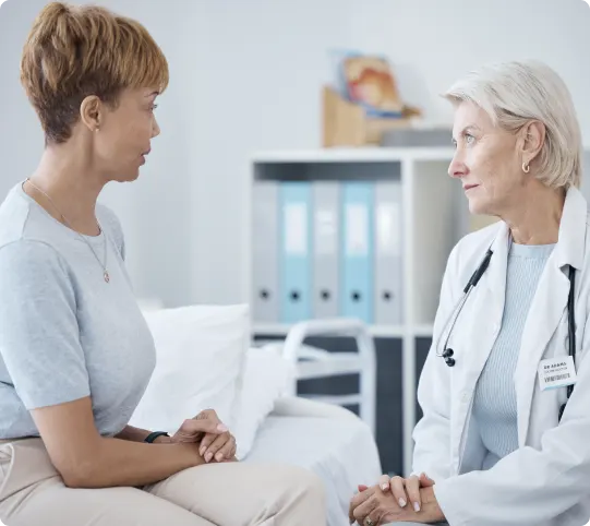 A doctor is talking to her patients